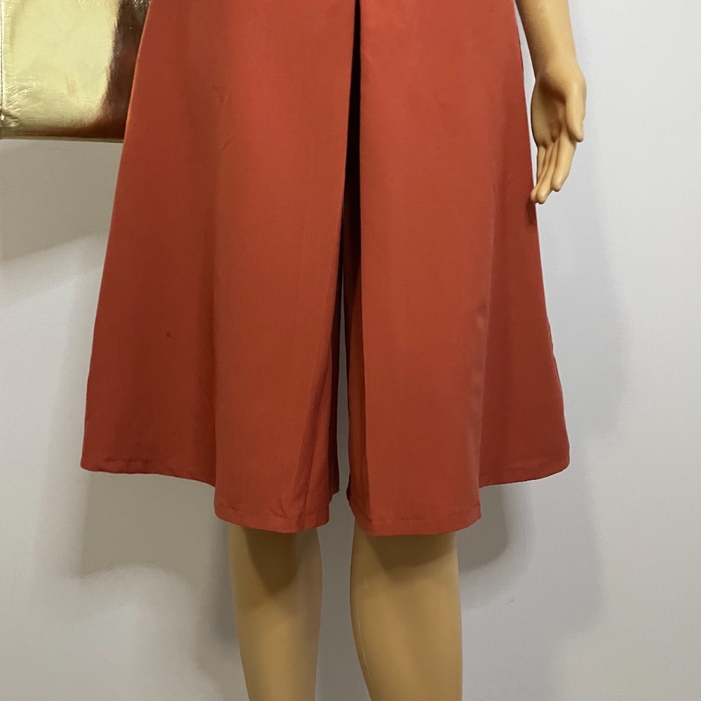 Burnt orange high waisted gaucho pants with pleating and wide leg fit below knee - Picture 5 of 10
